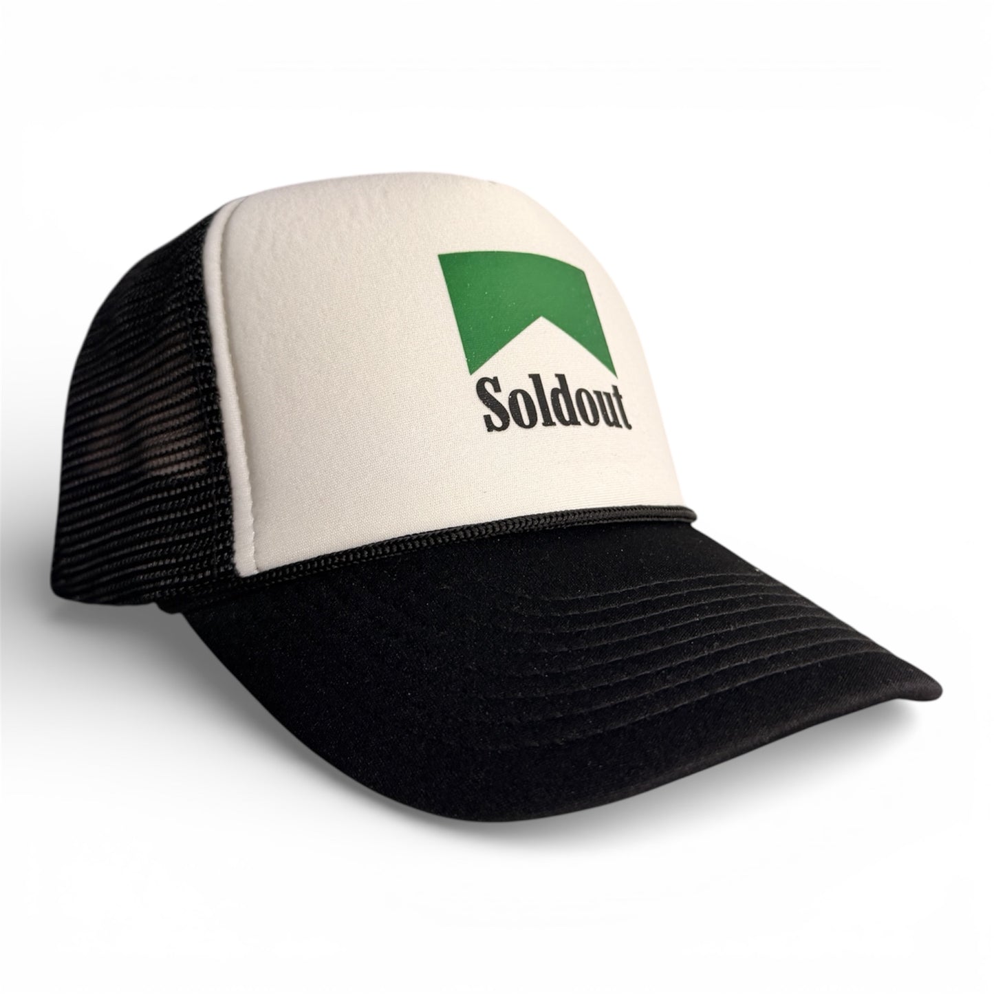 White and black mesh snapback hat with green Sold Out logo, black brim, and black mesh back