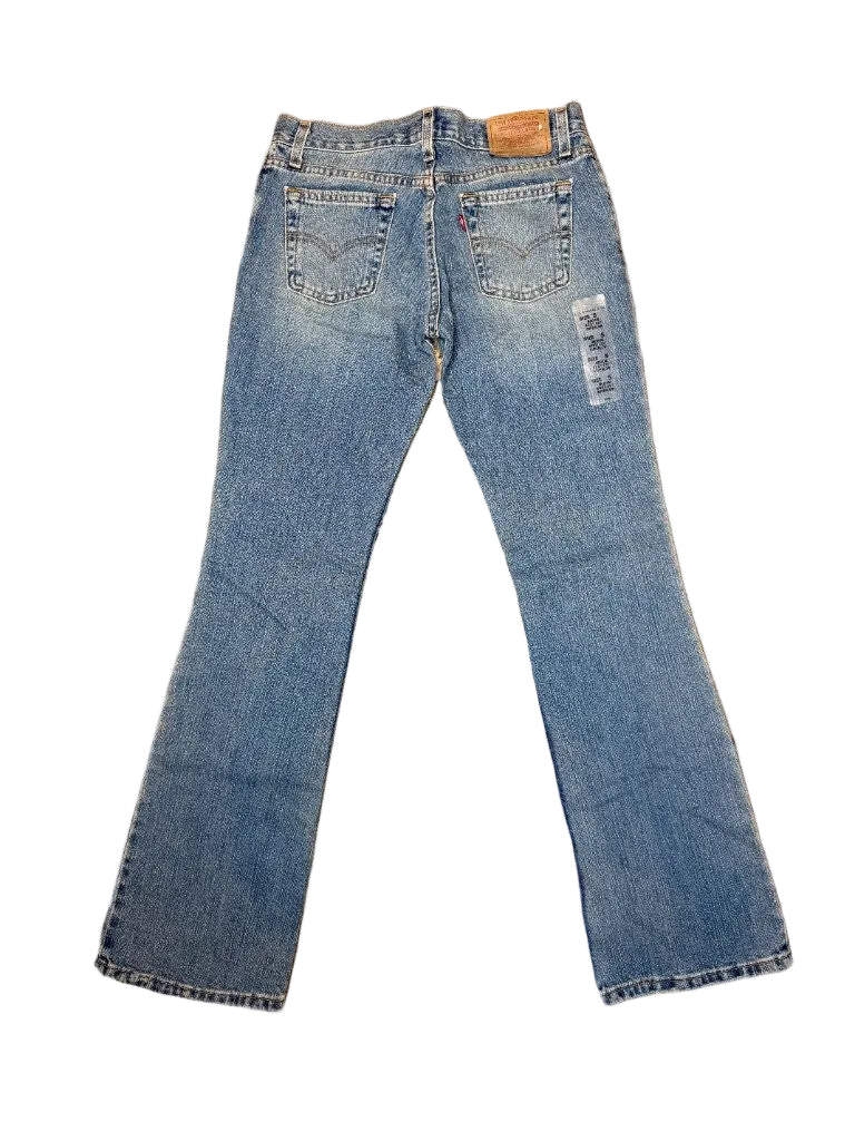vintage Levi's 505 straight leg jeans light wash back view tag visible downtown LA thrift