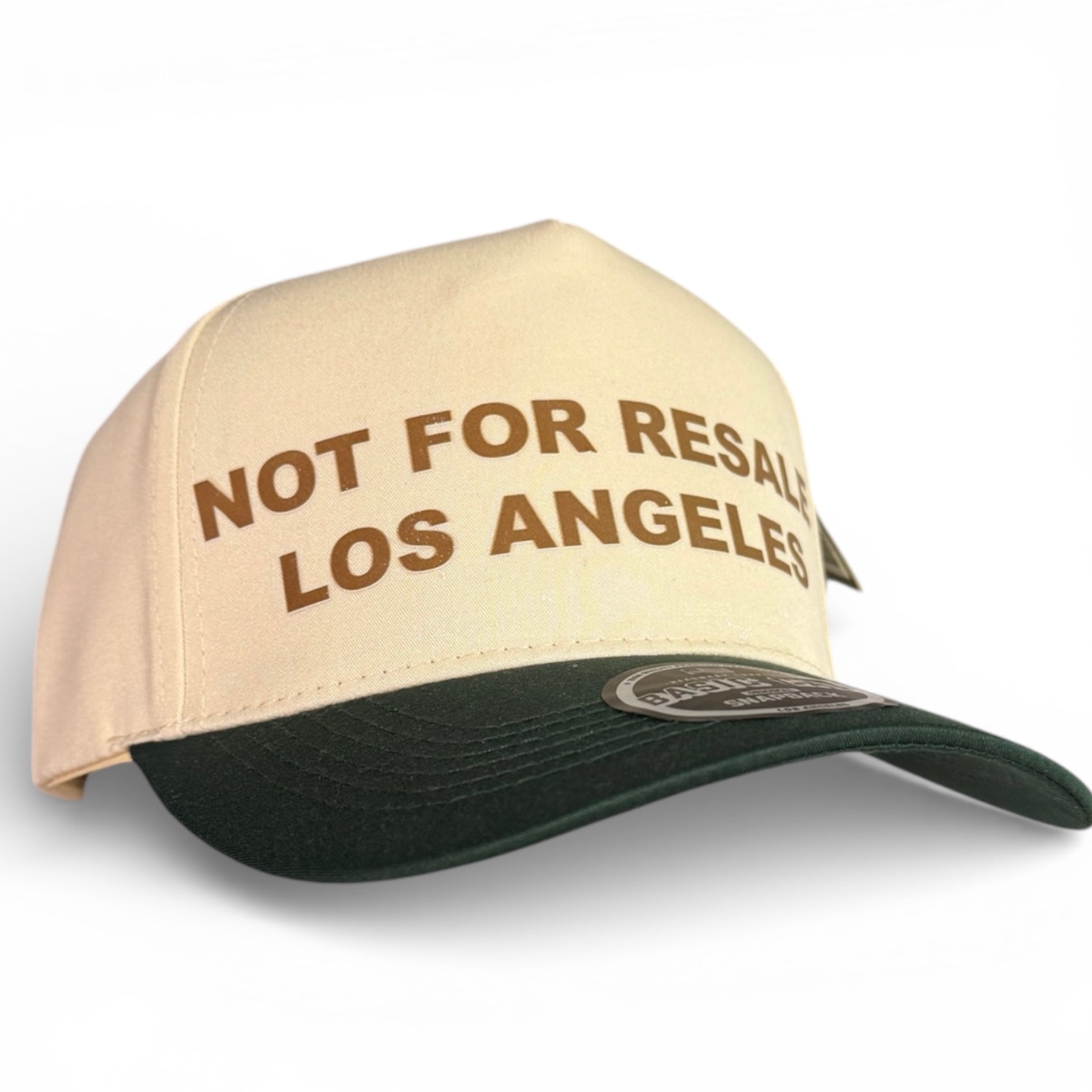 Not For Resale Los Angeles cream snapback hat with green brim and brown lettering
